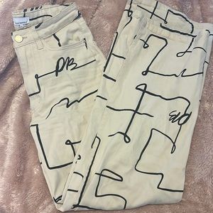 WeWoreWhat Scribble straight leg denim.